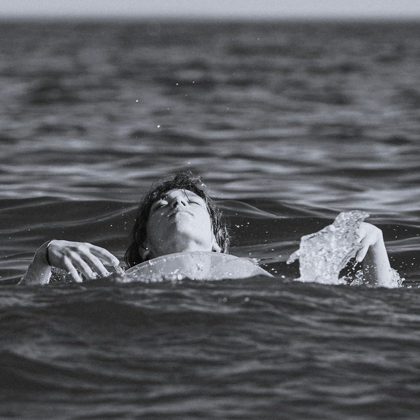 woman in water during daytime